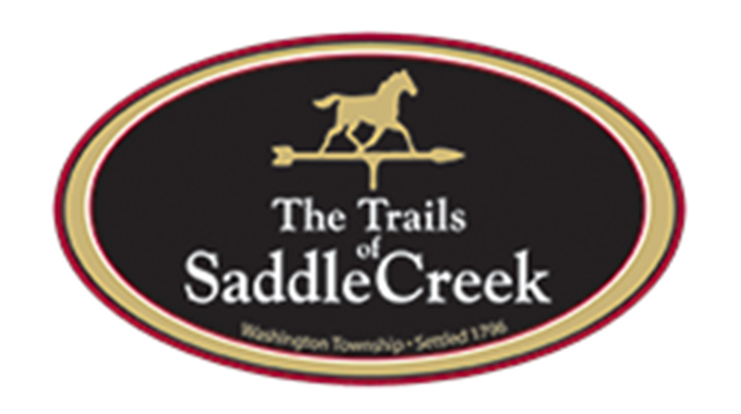 the trails of saddle creek logo